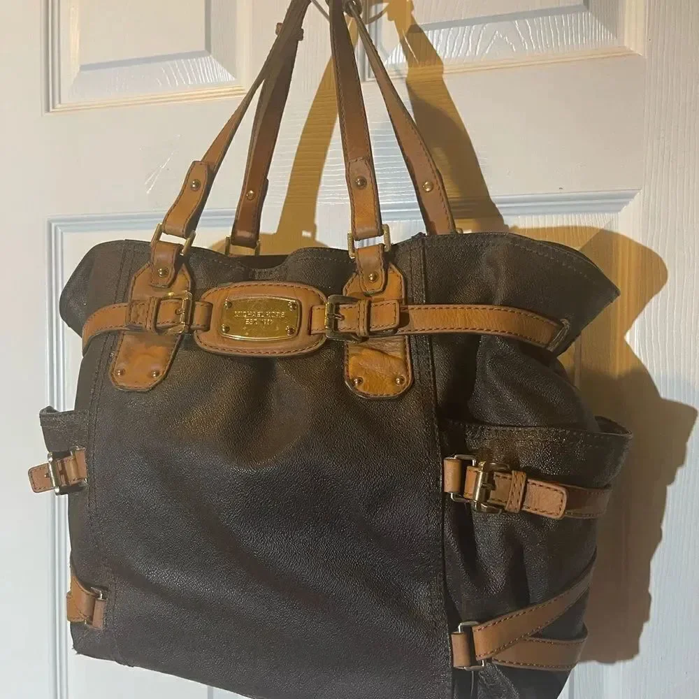 Michael Kors Brown coated canvas& tan leather straps &trims large shoulder bag.